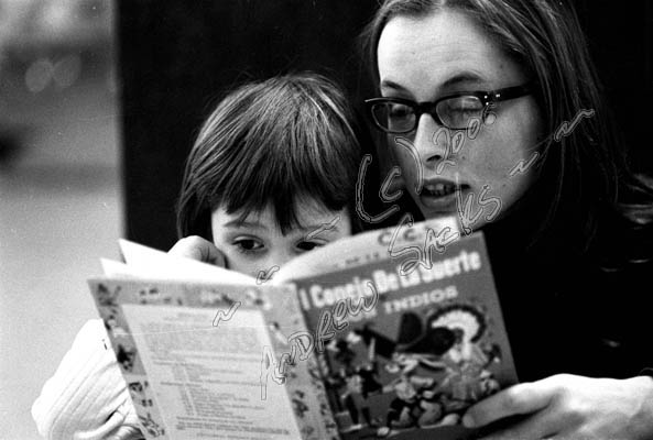 riana Oughton
Reading to a child in headstart program.