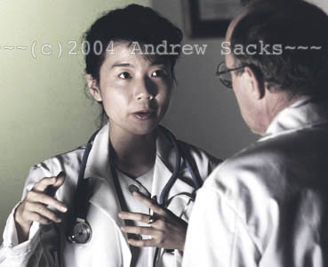 Two doctors confer