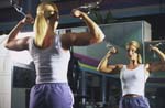 Woman lifts barbells